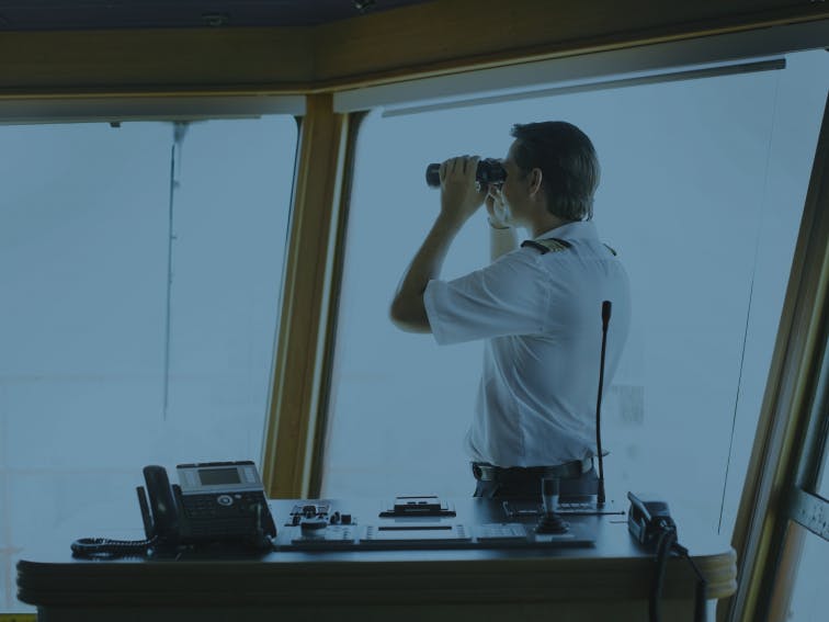 captain looking in a binocular