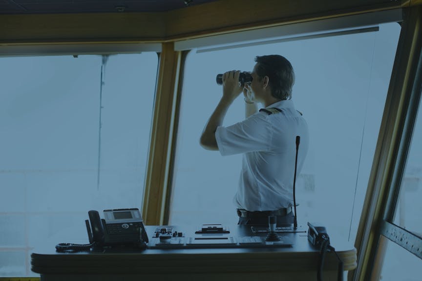 captain looking in a binocular