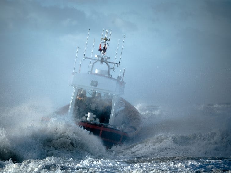 coast guard during storm in ocean shutterstock_4410715