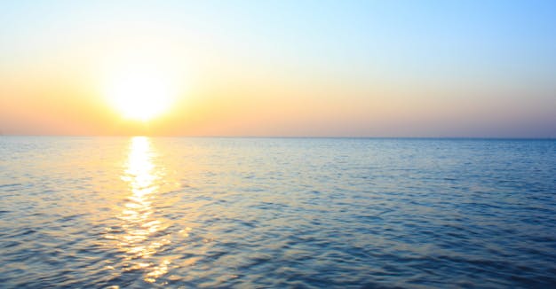 Bright sunset over water