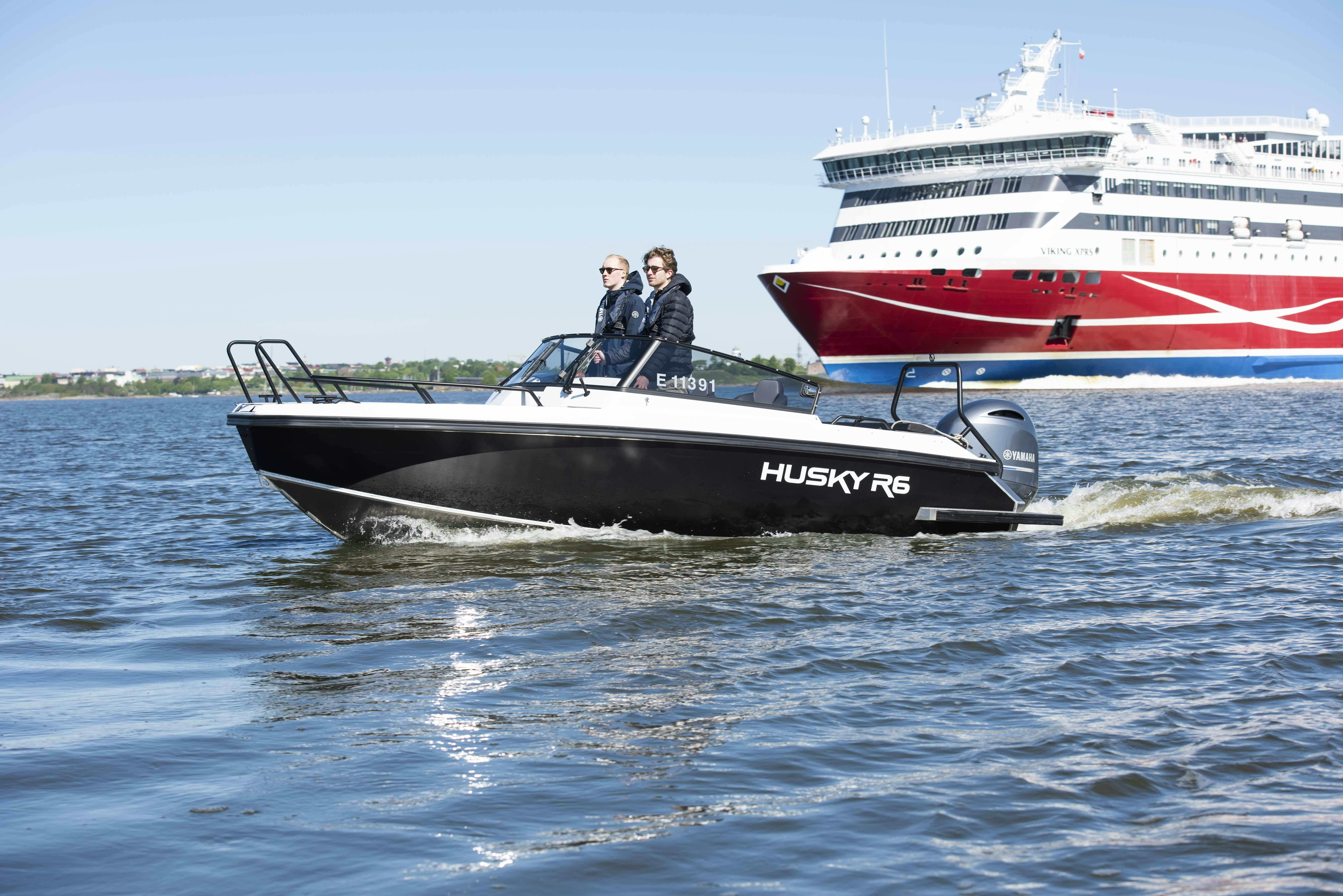 daycruiser in front of a ferry