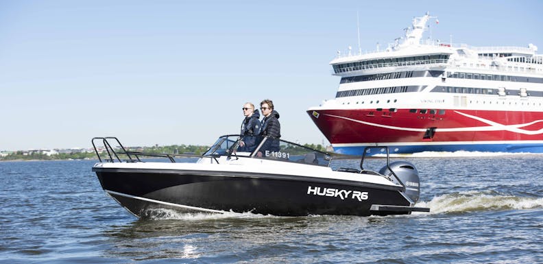 daycruiser in front of a ferry