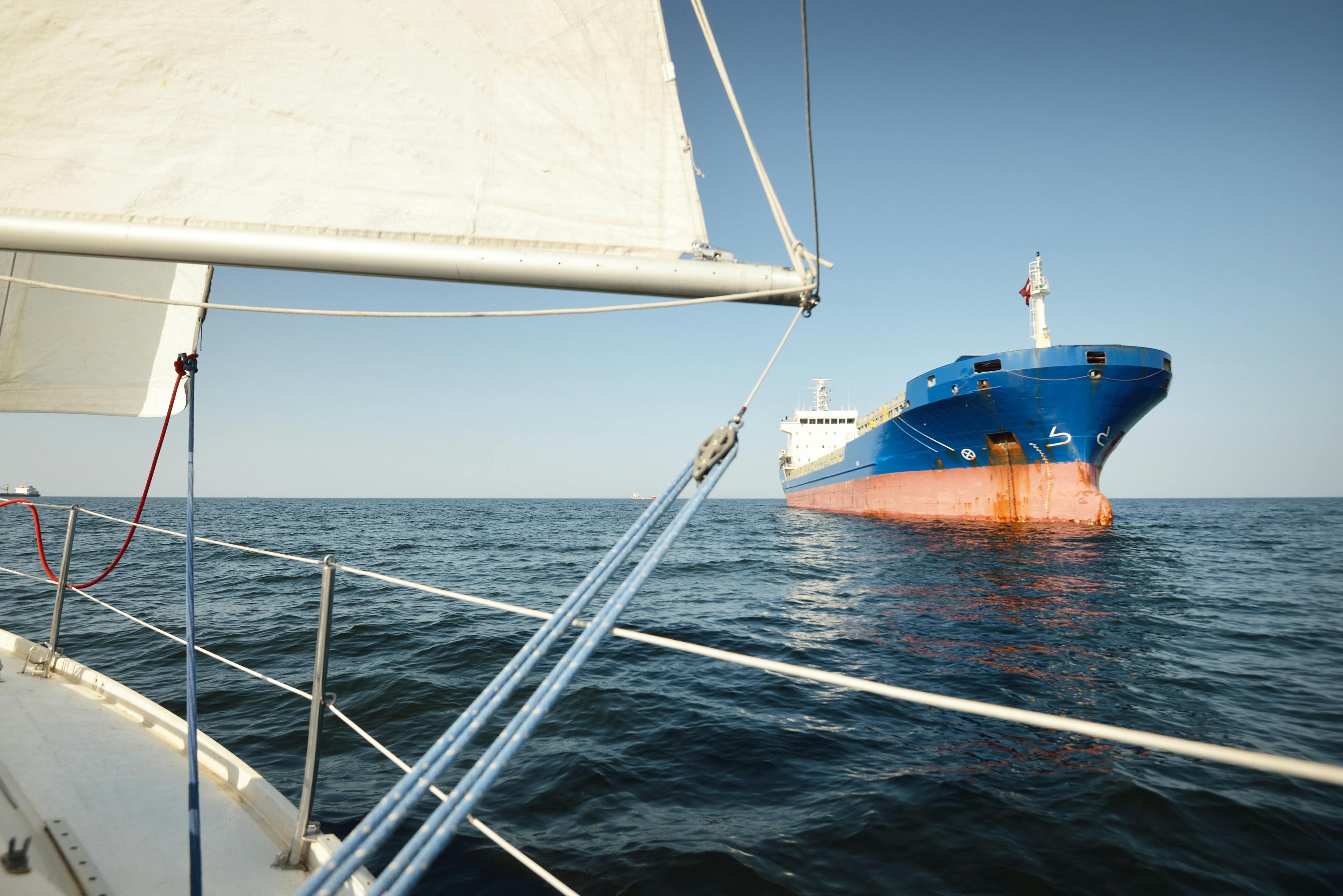 Large,Blue,Cargo,Ship,Anchored,In,Strait,Of,Gibraltar.,A