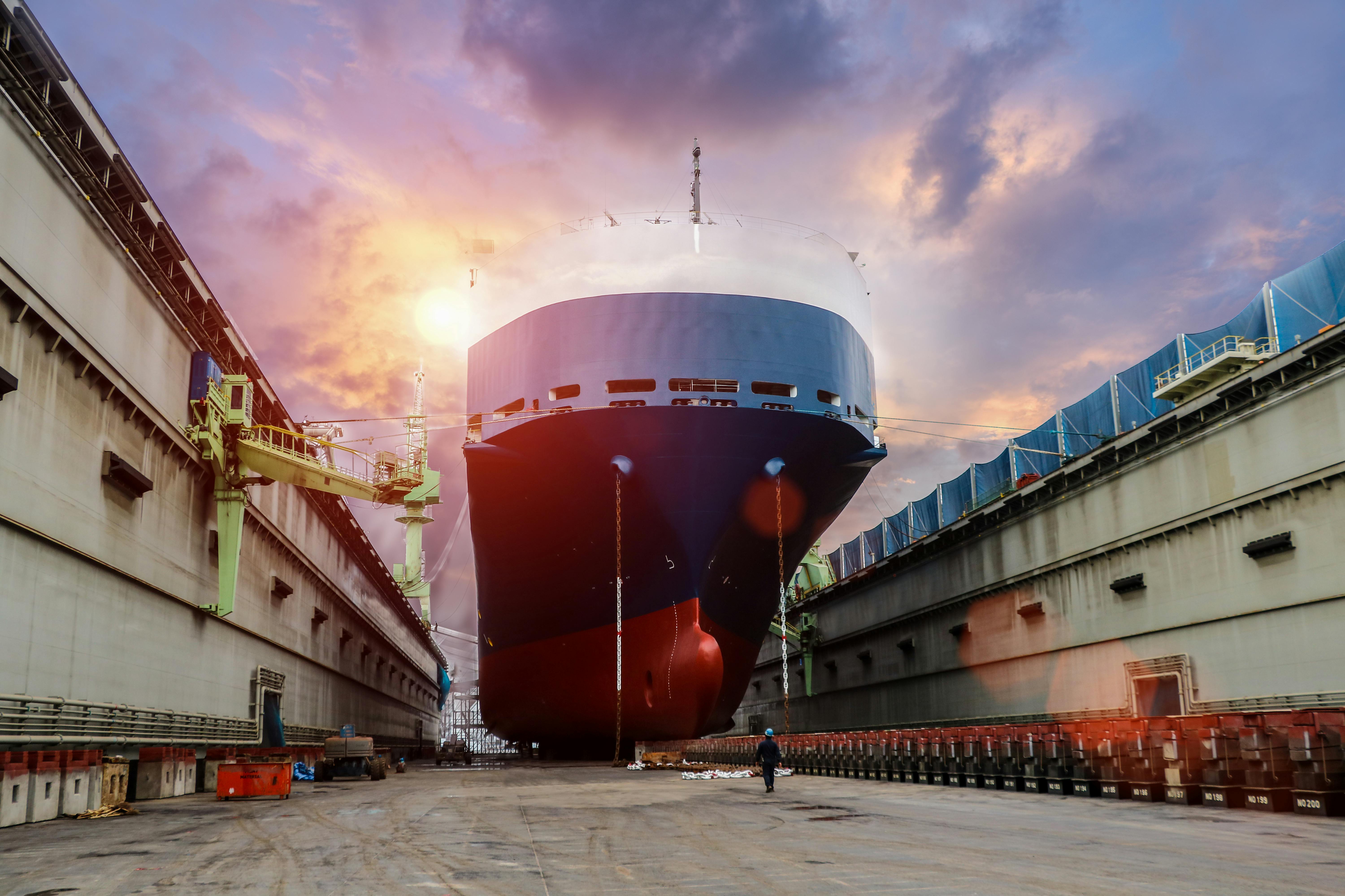 Ship,Under,Repair,In,Floating,Dry,Dock,Under,Sky,Cloud